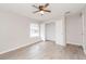 Bedroom featuring wood-look floors and a closet at 855 Third St, Orange City, FL 32763