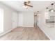 Welcoming living room with ceiling fan, stylish floors, and an open layout at 855 Third St, Orange City, FL 32763