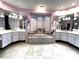 Bright bathroom with a soaking tub and and vanities at 8935 Jonathan Manor Dr, Orlando, FL 32819