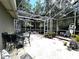 Spacious screened patio with ample seating, perfect for outdoor gatherings and relaxation at 8935 Jonathan Manor Dr, Orlando, FL 32819