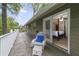 Cozy outdoor seating area leading into the house which has access to the main bedroom at 981 Victoria Ter, Altamonte Springs, FL 32701