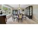 Elegant dining room with a large bay window, classic furnishings, and stylish decor at 981 Victoria Ter, Altamonte Springs, FL 32701
