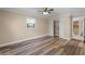 Comfortable bedroom with a large closet and a view of the backyard at 1013 Glensprings Ave, Winter Garden, FL 34787