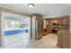 Open kitchen featuring stainless steel appliances, granite countertops and tiled flooring at 1013 Glensprings Ave, Winter Garden, FL 34787