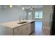Open concept kitchen with a large island and modern stainless-steel appliances at 16435 Sw 27Th Ave, Ocala, FL 34473