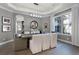 Bright dining room with a modern chandelier, large windows, and stylish decor at 3863 Grassland Loop, Lake Mary, FL 32746