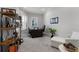 Home office with a large desk, ample light, and custom built-ins at 3863 Grassland Loop, Lake Mary, FL 32746