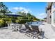 Luxury outdoor living space featuring a pool, spa, patio seating, and lush landscaping at 3863 Grassland Loop, Lake Mary, FL 32746