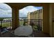 Private balcony offering panoramic views of the resort's amenities and surrounding landscape at 8125 Resort Village Dr # 51006, Orlando, FL 32821