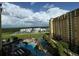 Aerial view showcasing the resort with large pool and waterpark area, surrounded by lush landscapes at 8125 Resort Village Dr # 51006, Orlando, FL 32821