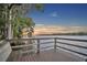 Scenic view from a wooden dock overlooking a tranquil lake at sunset at 1299 Harding Street, Winter Park, FL 32789