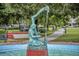 Bronze statue of Personal with harp in the fountain at 1299 Harding Street, Winter Park, FL 32789
