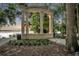 Elegant stone gazebo set in a park-like setting near a lakefront at 1299 Harding Street, Winter Park, FL 32789