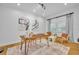 Well-lit office with hardwood floors, artwork, and comfortable seating arrangements for a productive workspace at 1299 Harding Street, Winter Park, FL 32789