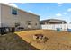 The property features a backyard with a firepit and a swing set, perfect for Gathering gatherings at 542 Patton Loop, Bartow, FL 33830