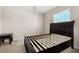 Bedroom featuring a window, a bed frame, and neutral walls at 542 Patton Loop, Bartow, FL 33830
