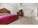 Large bedroom with furniture, ceiling fan, window, and soft carpet flooring at 542 Patton Loop, Bartow, FL 33830