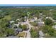 An aerial view of a residential neighborhood with mature trees and well-maintained homes at 9301 Echo Run, Orlando, FL 32817