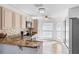 Well-lit kitchen featuring granite countertops, modern appliances, ample cabinet space, and a cozy breakfast nook with abundant natural light at 9301 Echo Run, Orlando, FL 32817