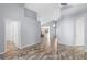 Spacious living room featuring tile floors, neutral walls, and an open floor plan perfect for comfortable living and entertaining guests at 9301 Echo Run, Orlando, FL 32817