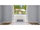 Open patio doors leading to a landscaped backyard with manicured lawn and fence at 9301 Echo Run, Orlando, FL 32817