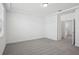 Bright bedroom boasts soft carpet and neutral walls at 16484 Silver Brook Way, Winter Garden, FL 34787