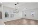 Spacious dining area with modern chandelier and ample natural light at 16484 Silver Brook Way, Winter Garden, FL 34787