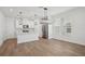Modern kitchen with stainless steel appliances and a large island at 16484 Silver Brook Way, Winter Garden, FL 34787