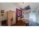 Cozy bedroom with hardwood floors, closet space, and a bright window offering plenty of natural light at 16843 Cedar Run Dr, Orlando, FL 32828