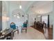 Inviting foyer with tile flooring, elegant furnishings, and seamless transition to the dining area at 16843 Cedar Run Dr, Orlando, FL 32828
