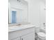 Bathroom featuring a shower, toilet, and vanity at 4709 Jasmine Cir, Leesburg, FL 34748