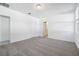 Bedroom featuring carpeted floor, two closets and natural light at 4709 Jasmine Cir, Leesburg, FL 34748