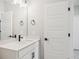 Bathroom features modern fixtures and a large mirror for lots of light at 5133 Passion Flower Way, Winter Garden, FL 34787