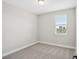 Bedroom features a large window and neutral color palette at 5133 Passion Flower Way, Winter Garden, FL 34787