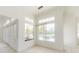 Dining area with natural light and French doors leading to the lanai at 6550 Cartmel Ln, Windermere, FL 34786
