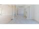 Grand foyer with tall ceilings, light wood floors, columns, and an elegant front door at 6550 Cartmel Ln, Windermere, FL 34786
