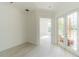 Living room featuring hardwood floors, natural light, and french doors at 6550 Cartmel Ln, Windermere, FL 34786