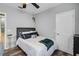 Comfortable bedroom featuring modern decor, stylish flooring, and ample natural light at 889 Kensington Gardens Ct, Oviedo, FL 32765