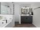 Stylish bathroom with modern fixtures, a walk-in shower, and a soaking tub at 10033 Hart Branch Cir, Orlando, FL 32832