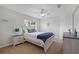 Cozy bedroom features a ceiling fan, carpet, and soft, neutral colored walls at 10033 Hart Branch Cir, Orlando, FL 32832