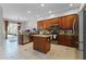 Spacious kitchen with stainless steel appliances, granite countertops, and a central island at 10033 Hart Branch Cir, Orlando, FL 32832