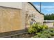 Water feature and stone sign reading 
