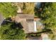 Aerial view of the property featuring a private pool, screened-in lanai, and fenced yard at 109 Romney Marsh Rd, Longwood, FL 32779