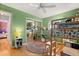 Unique bedroom with a bunk bed and a closet with mirrored doors and green walls at 109 Romney Marsh Rd, Longwood, FL 32779