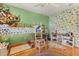 Fun bedroom featuring a bunk bed, green walls, and whimsical decor at 109 Romney Marsh Rd, Longwood, FL 32779