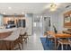 Kitchen with a dining area, light cabinets, neutral walls, and tile floors at 109 Romney Marsh Rd, Longwood, FL 32779