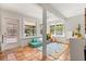 Bright living room with tiled floor and white walls at 109 Romney Marsh Rd, Longwood, FL 32779