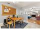 Living area with a wooden table, a workspace, and access to a large and comfortable living space at 109 Romney Marsh Rd, Longwood, FL 32779