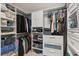 Organized walk-in closet featuring shelves, drawers, and hanging rods to maximize storage and space at 109 Romney Marsh Rd, Longwood, FL 32779