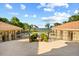Expansive backyard with a pool and manicured landscaping providing serene water views at 1112 Orange Ave, Winter Springs, FL 32708
